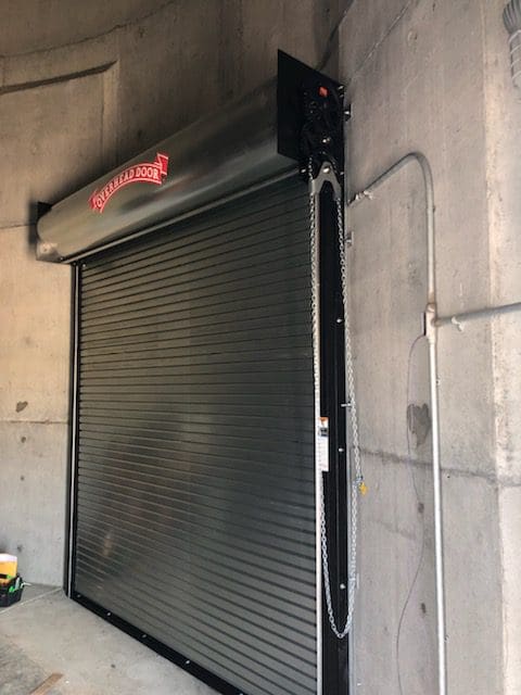 Grey Commercial Steel Door installed in Rapid City, SD.