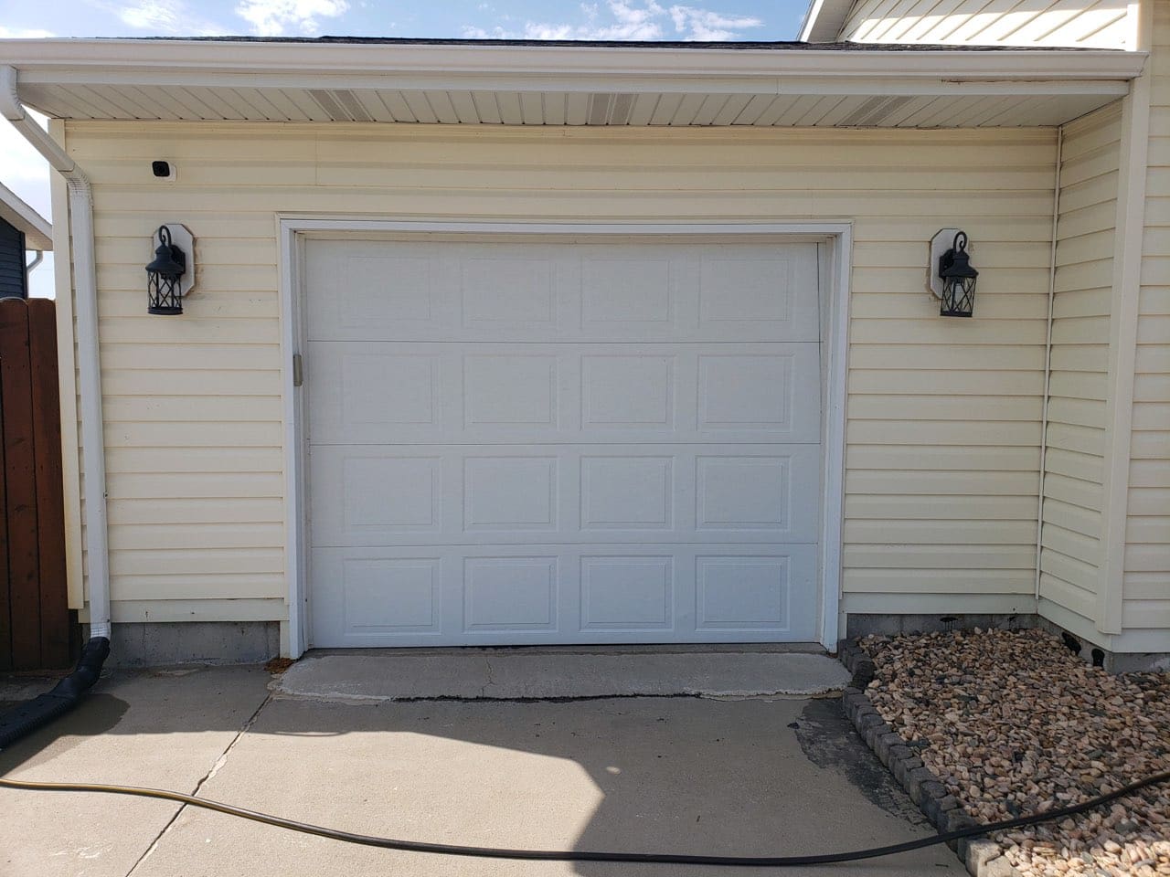White Residential Sectional Garage Door before installation by Overhead Door Company of Rapid City.