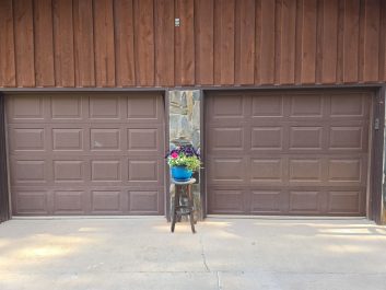 Brown residential garage doors before photo