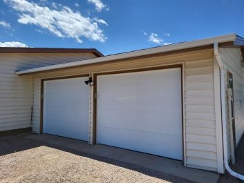 After of updated white 2 door 2 car garage
