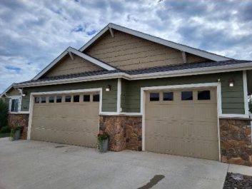 Before of dated taupe 2 door 2 garage